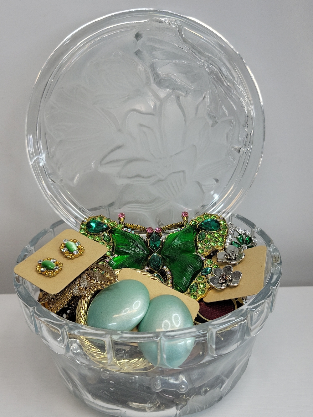 Glass Trinket Dish Filled With Jewelry